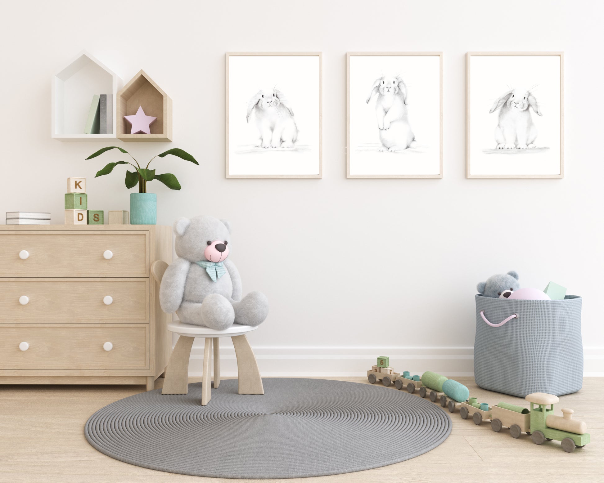 Set of 3 white bunny sketches in grey on a plain white background. Prints are mounted in wood frames and hung on a wall of a child's bedroom - Studio Q - Art by Nicky Quartermaine Scott