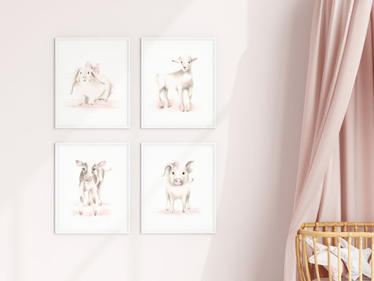 Set of four baby animal sketch prints in beige and pink colors. The prints are on a white background and mounted in white frames. The set of 4 prints are hung on a pink baby girl's room - Studio Q - Art by Nicky Quartermaine Scott